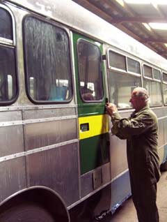 Emergency door being refitted © J.Wilkins